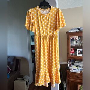 NWOT bright yellow (like school bus yellow) dress with white polka dots. Small.